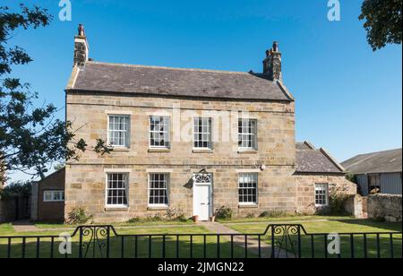 Bamburgh Hall, un bâtiment classé à Bamburgh, Northumberland, Angleterre, Royaume-Uni Banque D'Images
