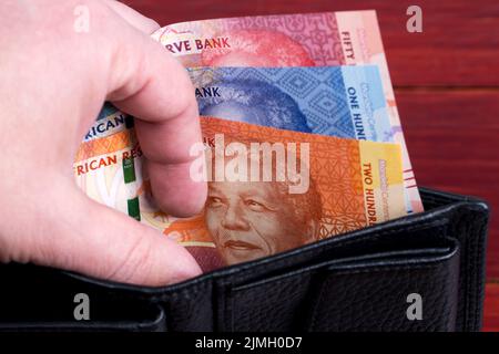 Argent sud-africain - Rand dans le portefeuille noir Banque D'Images