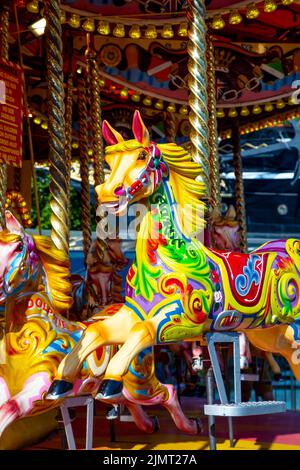 Cheval coloré sur un carrousel (Greenwich, Londres, Royaume-Uni Banque D'Images