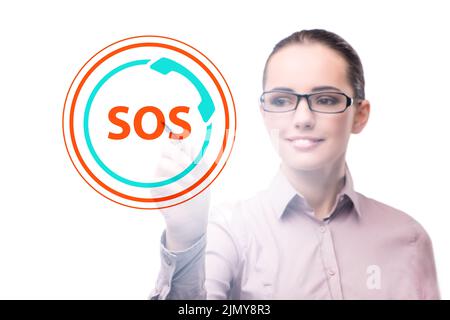 Femme d'affaires appuyant sur le bouton SOS en cas de danger Banque D'Images