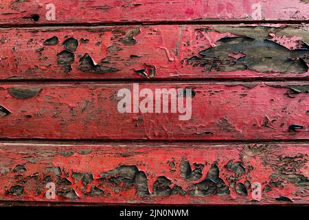 arrière-plan rustique avec une texture de bois peint en rouge vieilli Banque D'Images