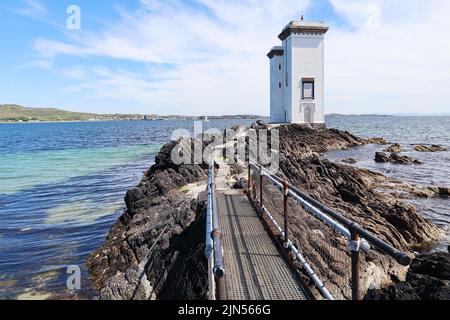 Le chemin menant au phare de Carraig Fhada, le seul en Écosse qui est carré. Situé près de Port Ellen, Islay. Banque D'Images