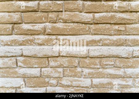 Texture de fond crème avec béton couleur inégale de briques beiges. Arrière-plans et textures Banque D'Images