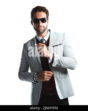 Soyez simple, mais affirmez-vous. Studio photo d'un beau jeune homme posant sur un fond blanc. Banque D'Images