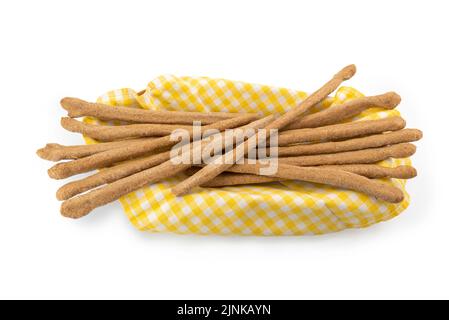 Barres de pain étirées à la main (stirati a mano, en italien) sur une serviette jaune et blanc à carreaux, barres de pain croustillantes typiques de Turin cuites à la wholemea Banque D'Images