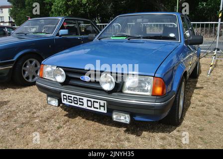 Une Ford Escort Mk3 1984 exposée au salon automobile classique de la Côte d'Azur, Paignton, Devon, Angleterre, Royaume-Uni. Banque D'Images