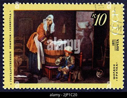 URSS - VERS 1971: Un timbre imprimé en URSS à partir du numéro "tableaux étrangers dans les musées russes" montre la Washerwoman par Chardin, 1737. Banque D'Images