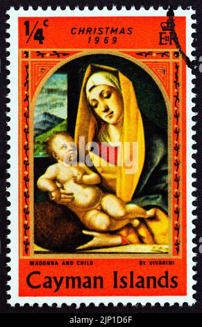 ÎLES CAÏMANS - VERS 1969: Un timbre imprimé dans les îles Caïmans du numéro de Noël montre Madonna et l'enfant par Vivarini, vers 1969. Banque D'Images