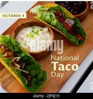 Composition du texte de la journée nationale des tacos d'octobre 4 avec tacos à bord. Image générée numériquement par le concept national de fête et de fête du taco. Banque D'Images