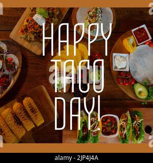 Composition du texte Happy taco day avec tacos sur la table. Image générée numériquement par le concept national de fête et de fête du taco. Banque D'Images