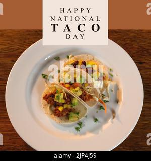 Composition du texte du jour de tacos national heureux avec tacos sur la table. Image générée numériquement par le concept national de fête et de fête du taco. Banque D'Images