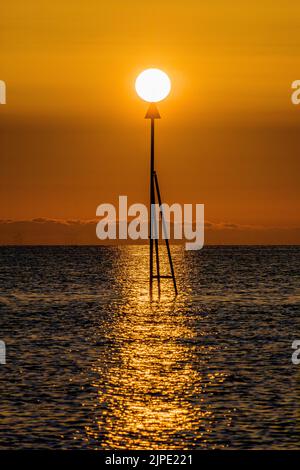 Lever du soleil à Colwyn Bay, au nord du pays de Galles, au Royaume-Uni Banque D'Images