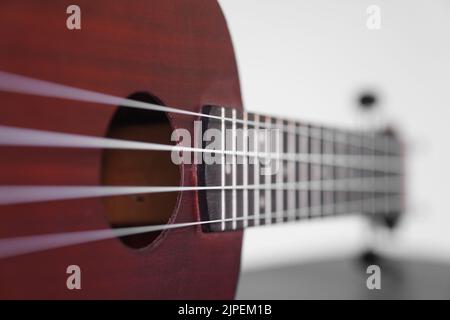 Un gros plan de quatre ukulele à cordes Banque D'Images