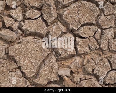 Grande texture de sol brun parché du réchauffement climatique Banque D'Images