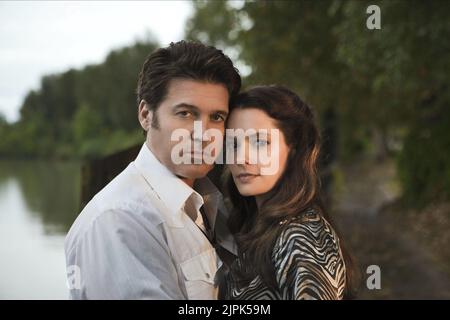 BILLY RAY CYRUS, GINA HOLDEN, NOËL REVIENT À LA MAISON À CANAAN, 2011 Banque D'Images