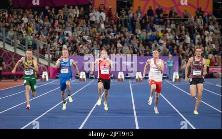 Charl du toit, Alexander Thomson, Rhys Jones, Shaun Burrows et Zachary Gingras en compétition pour la finale masculine du T37/38 100m aux Jeux du Commonwealth à Banque D'Images