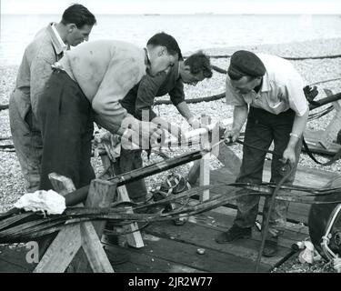 Pose des câbles de rail 1961 Banque D'Images