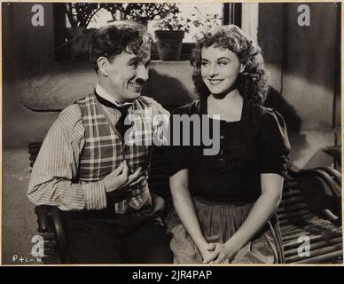 Charlie Chaplin et Paulette Goddard dans « le Grand dictateur » par William Wallace (United Artists, 1940). Banque D'Images