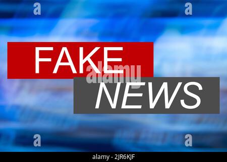 Image symbole de fake News: L'écran d'un programme imaginaire de nouvelles montre une carte du monde et les mots fake News Banque D'Images