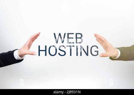 L'écriture de texte Web Hosting. Mot écrit sur l'activité de fournir de l'espace de stockage et l'accès aux sites Web informations importantes présentées entre Banque D'Images