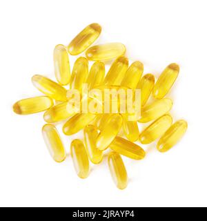 Pile de gélules de Softgels Omega 3 isolées sur fond blanc. Gros plan, vue de dessus, pose à plat Banque D'Images