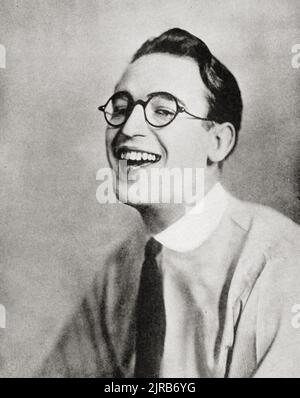 Harold Lloyd donnant son fameux grin dans qui est qui à l'écran, 1920. Beaucoup de publicités pendant cette période ont été basées sur cette photo. Banque D'Images