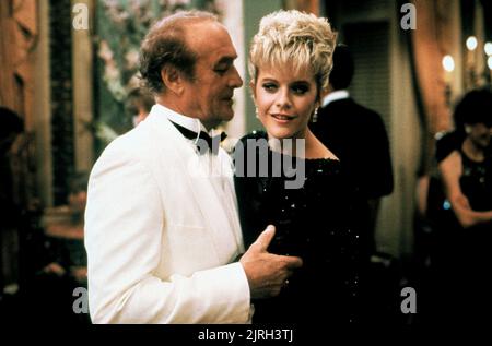 ROBERT LOGGIA, MEG RYAN, ARMÉ ET DANGEREUX, 1986 Banque D'Images