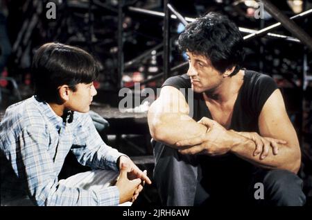 DAVID MENDENHALL, Sylvester Stallone, AU-DESSUS, 1987 Banque D'Images