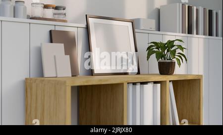 Design minimaliste scandinave de l'intérieur du salon gros plan, un cadre photo vide se moque sur une bibliothèque en bois au-dessus du mur blanc. 3d rendu, 3d il Banque D'Images