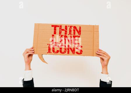 Icônes de ligne fine de texte d'écriture manuscrite. Symboles d'idée d'entreprise utilisés dans les téléphones cellulaires et d'autres applications comme boutons Homme tenant Un stylo et appuyant sur Power Banque D'Images