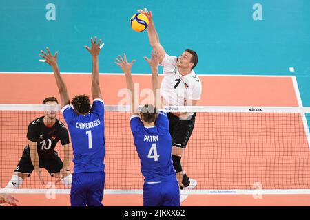 Christian Fromm (Allemagne), Barthélémy Chinenyeze, Jean Patry (France). Championnat du monde de volleyball 2022. Banque D'Images