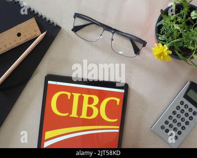 Dans cette illustration, le logo de la Banque canadienne Impériale de Commerce (CIBC) est affiché sur une tablette Banque D'Images