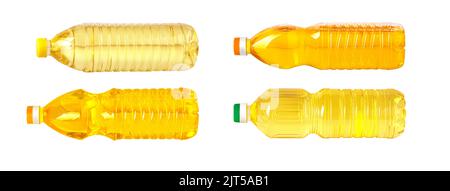 une bouteille d'huile en plastique repose sur un fond blanc Banque D'Images