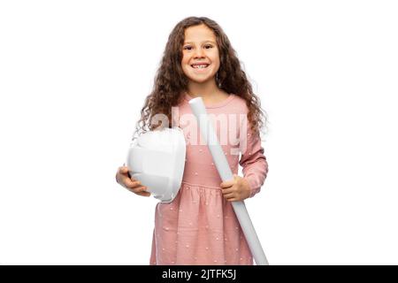 petite fille avec casque de construction et photocalque Banque D'Images