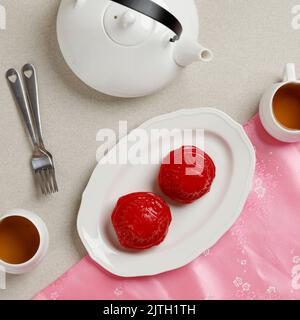 ANG Kue Ku ou Kue Thok, pâtisserie chinoise vapeur à base de farine de riz gluant avec garniture de pâte de haricots Mung doux. Vue de dessus Banque D'Images