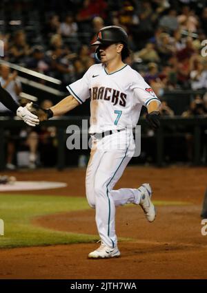 Arizona Diamondbacks' Gabriel Moreno hits against the Milwaukee Brewers  during the fourth inning of a baseball game, Monday, April 10, 2023, in  Phoenix. (AP Photo/Matt York Stock Photo - Alamy