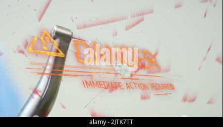 Image du texte danger sur la perceuse dentaire Banque D'Images