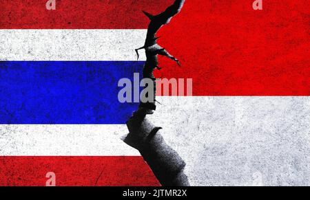 L'Indonésie contre la Thaïlande drapeaux sur un mur avec une fissure. Conflit en Thaïlande et en Indonésie, crise de guerre, relation, économie, concept commercial Banque D'Images