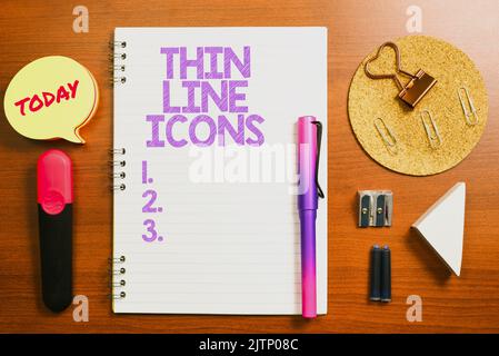 Texte montrant l'inspiration icônes de ligne mince, mot écrit sur les symboles utilisés dans les téléphones cellulaires et d'autres applications comme les boutons homme d'affaires tenant Une tablette montrant dessus Banque D'Images