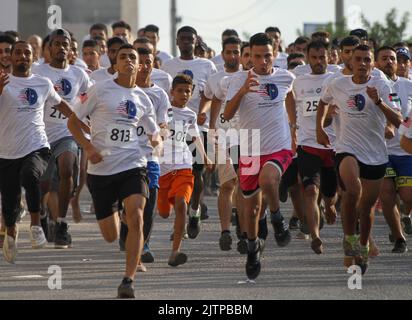 Gaza, bande de Gaza, Palestine. 31st août 2022. Gaza, Palestine. 31 août 2022. 700 coureurs participent à un marathon à Gaza, marquant le jour de l'indépendance de la Malaisie en 65th (photo : © Ahmad Haaballah/IMAGESLIVE via ZUMA Press Wire) Banque D'Images
