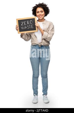 femme avec zéro mot de gaspillage sur le tableau de surveillance Banque D'Images