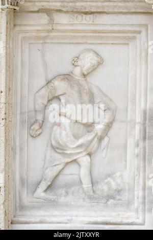 Novembre : le labour et l'ensemencement - détail de Fontana Maggiore (1275), un chef-d'œuvre de sculpture médiévale symbole de la ville de Pérouse - Italie Banque D'Images