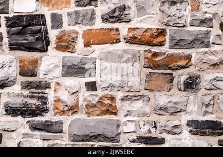 Une texture de gros plan d'un vieux mur de briques Banque D'Images