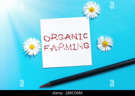 Rédaction affichage de texte Organic Farmingan système agricole intégré qui s'efforce de la durabilité. Aperçu de l'entreprise un système agricole intégré Banque D'Images