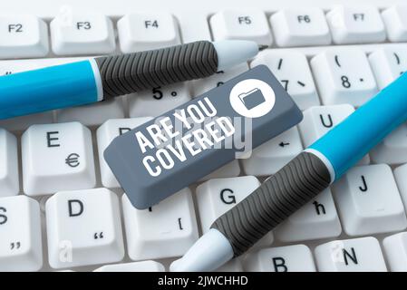 Affiche de texte êtes-vous CoveredAsker au sujet de la façon dont les médicaments sont couverts par votre régime. Mot pour demander comment les médicaments sont couverts par votre plan Banque D'Images