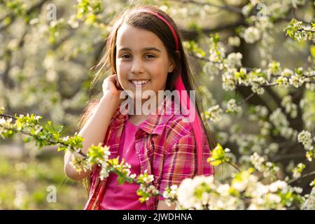 belle fille avec un beau sourire, fille de neuf ans Banque D'Images