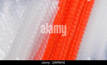 Matériau d'emballage à bulles d'air d'emballage en plastique, sacs d'air pour l'emballage, protection à bulles d'air plastique papier d'emballage texture arrière-plan, concept logistique Banque D'Images