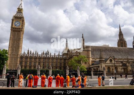 Parliament Square, Westminster, Londres, Royaume-Uni. 7th septembre 2022. Les manifestants ont donné des salopettes orange et tenu des écriteaux et des banderoles appelant à la fermeture des installations de la baie de Guantanamo à Cuba Banque D'Images