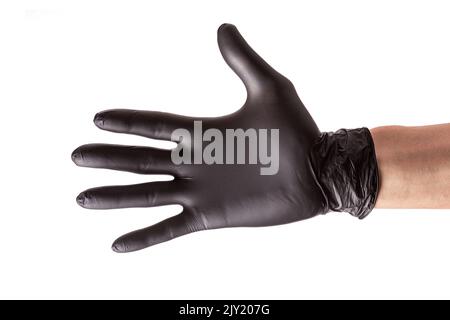 Main dans un gant en caoutchouc noir isolé sur fond blanc.Main étirée pour une poignée de main, un gros plan Banque D'Images