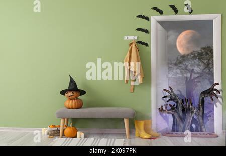 Collage de l'intérieur du couloir avec des décorations d'Halloween et des mains zombies Banque D'Images
